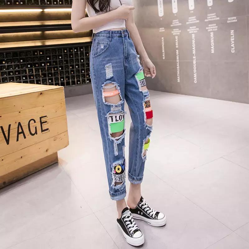 torn pants , torn jeans, close up girl wear jean - women knees in jeans  holes in jeans, fashion clothing. Hips and knees in fashionable jeans  18967437 Stock Photo at Vecteezy